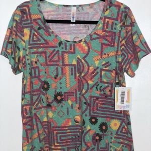 LuLaRoe Classic Tee NWT Medium 
2nd pic Size Chart